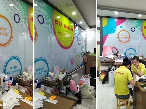 Phông nền kính văn phòng sử dụng thành phẩm từ dịch vụ in decal khổ lớn